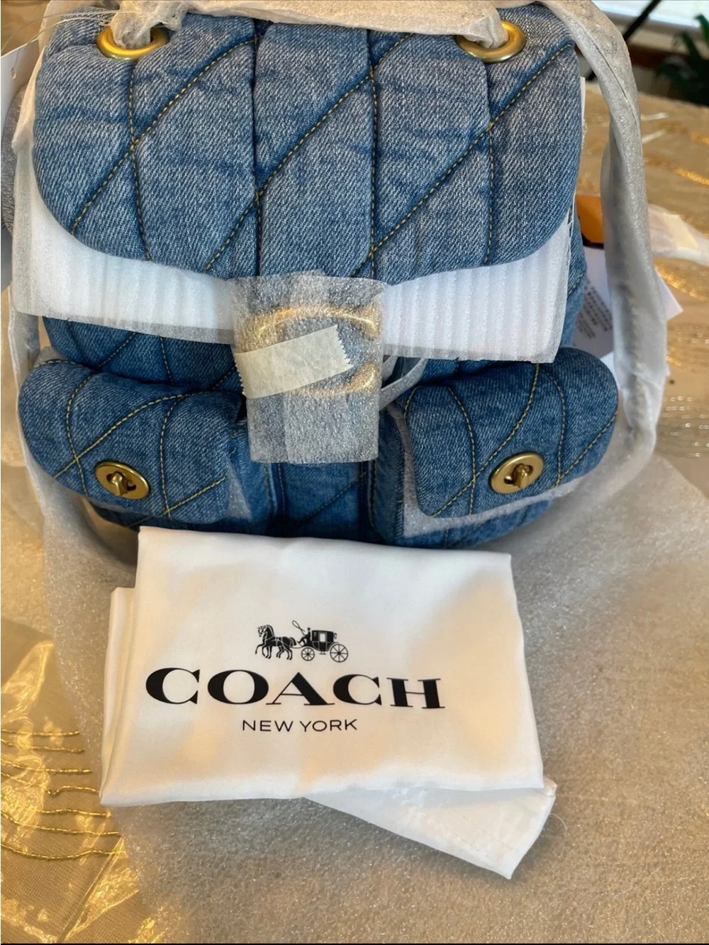 Coach quilted denim